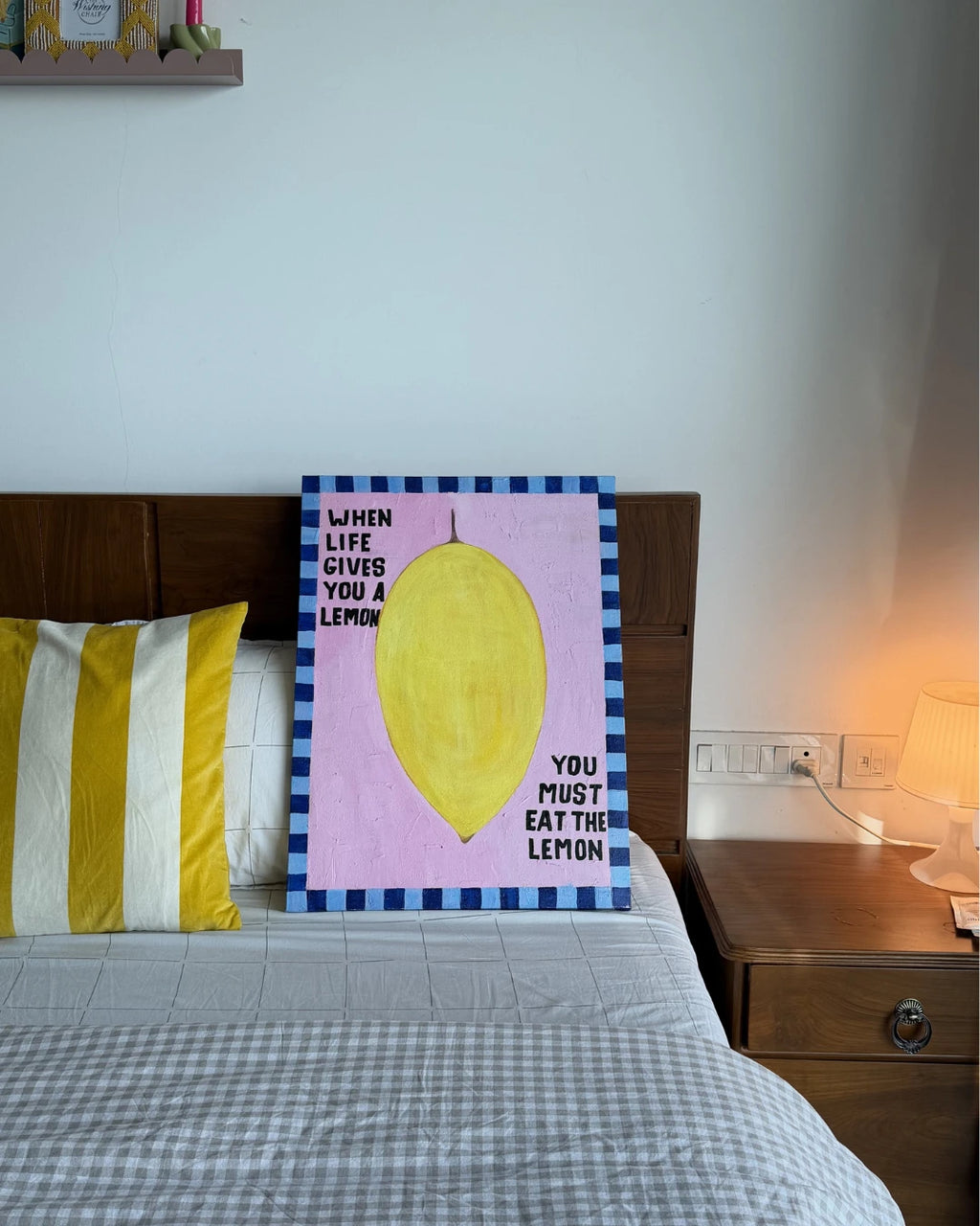 Decorative Painting with lemon design on a bed in a bedroom setting