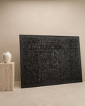 Handmade black textured abstract painting with raised horizontal grid patterns and rich sculptural detailing, creating a bold monochromatic statement piece for contemporary interiors.
