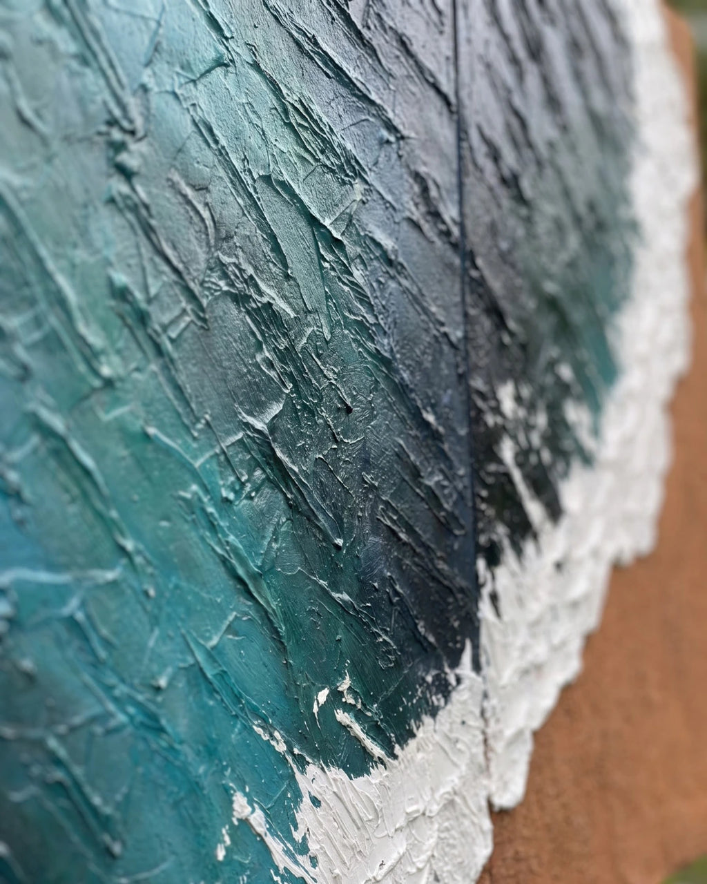 Side angled view of Coastal Calm diptych showing raised wave texture and depth