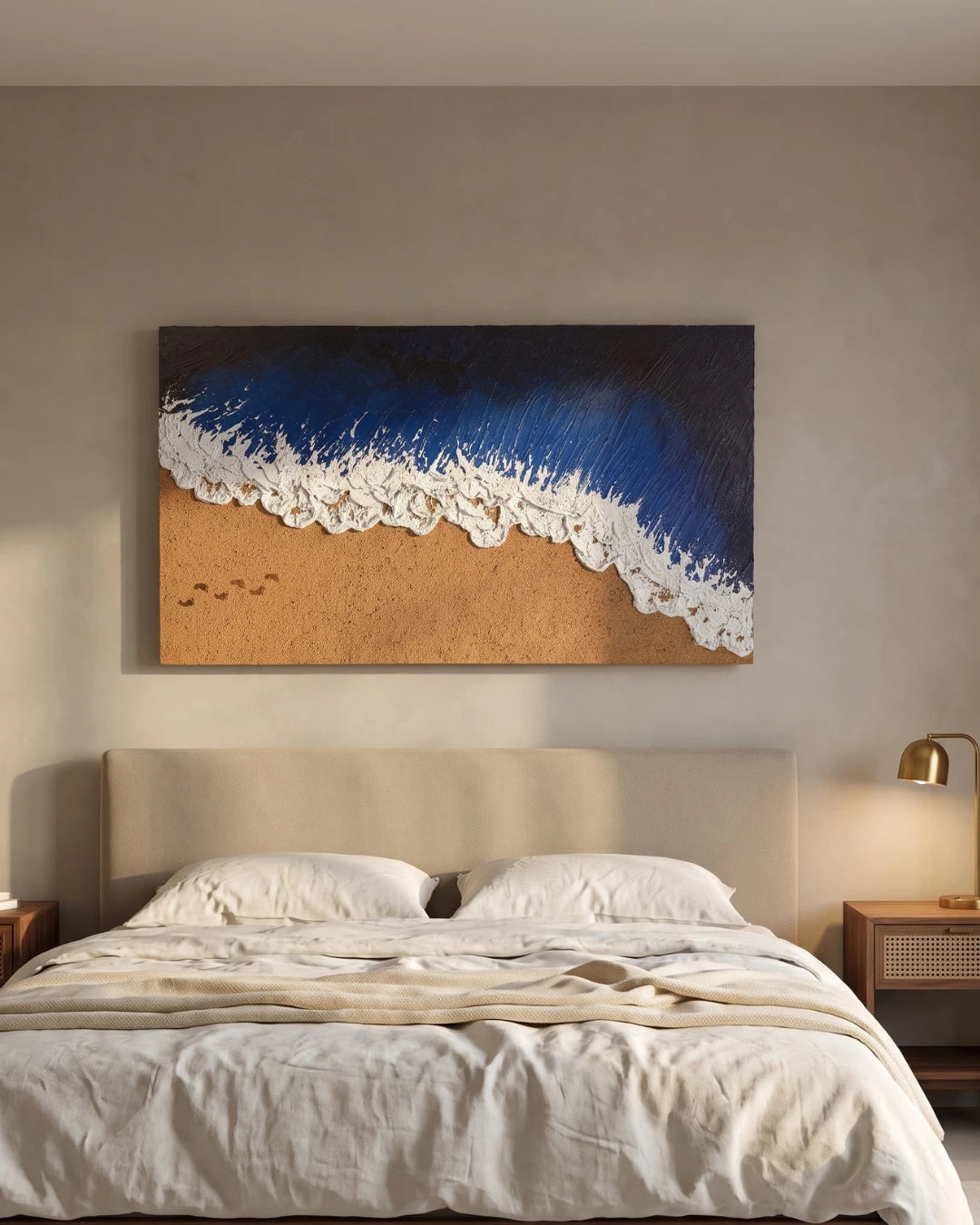 Deep Water navy wave painting hanging above a bed in a modern bedroom