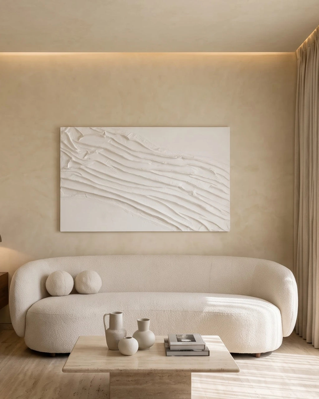Folded White textured painting hanging above a sofa in a minimal living room