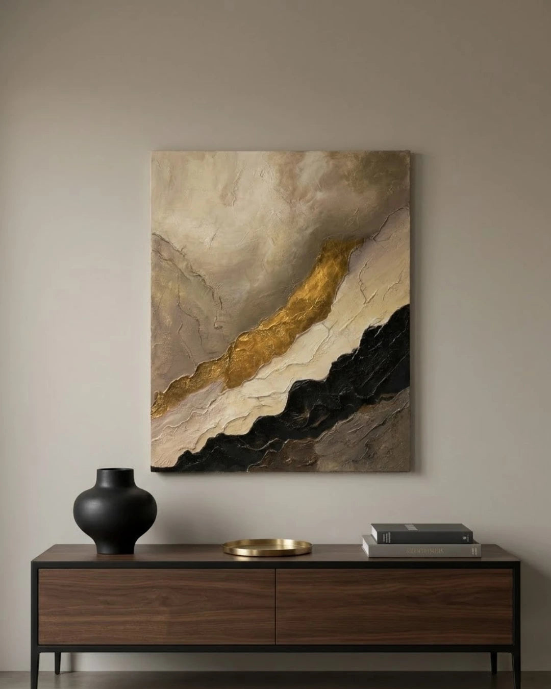 Gold Vein textured painting hanging above a console table in a dark moody interior