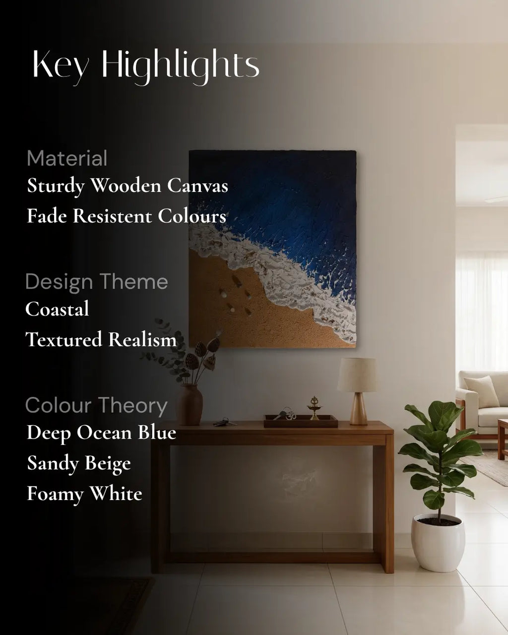 A coastal-themed canvas wall art print displayed in a modern living room setting above a wooden console table. The artwork features a deep blue ocean with white surf and a sandy beige shore.