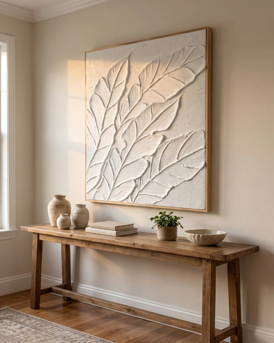 Side view of Palm Study canvas under raking light showing sculpted leaf relief and deep shadow