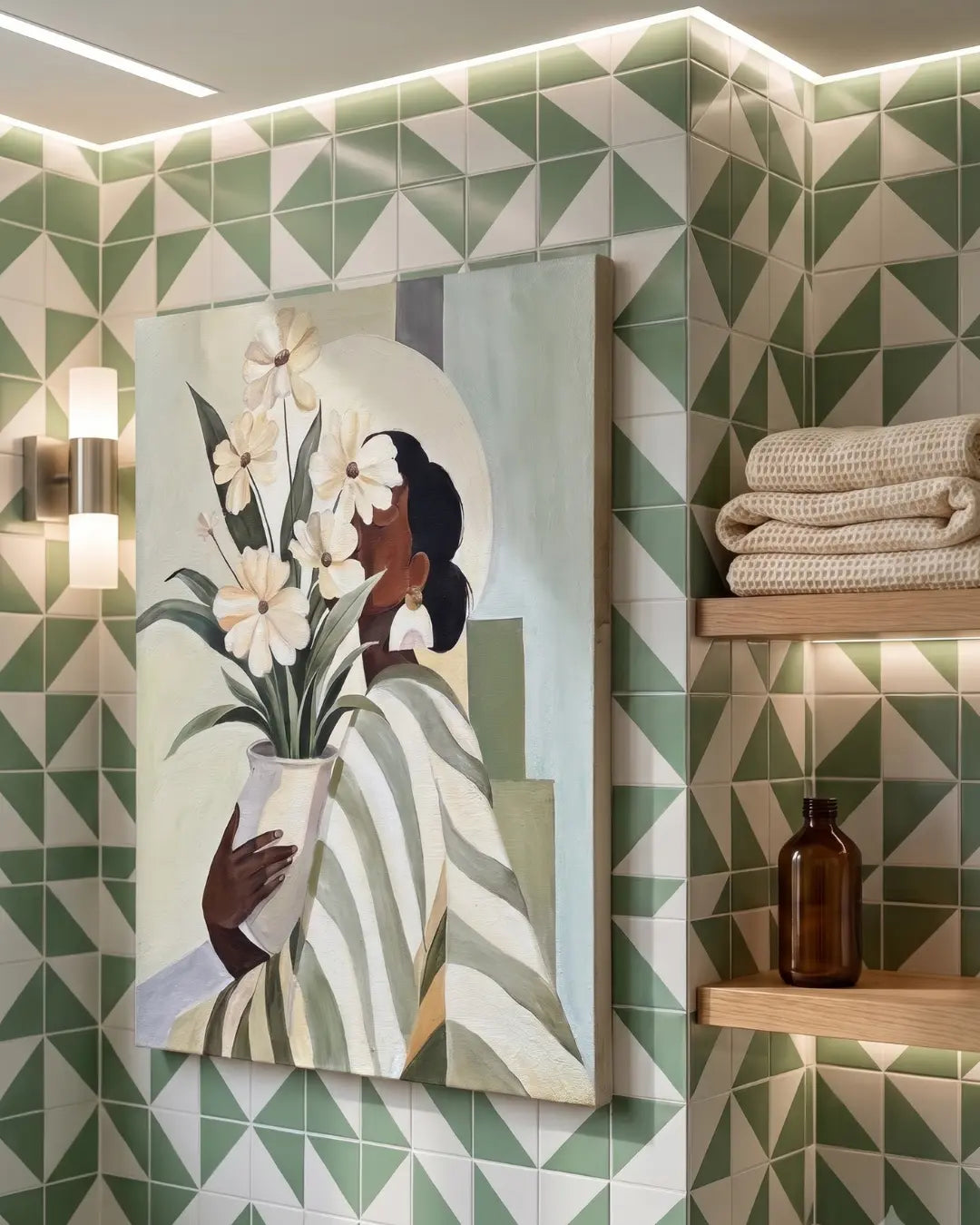 Petals & Her figurative floral painting hanging on a green tiled bathroom wall