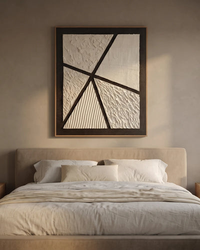 Prism cream geometric textured painting hanging above a bed in a modern Indian bed room