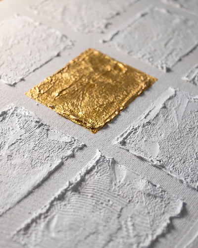 Close-up of the gold leaf square on Rare canvas showing hand-applied metallic texture