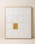 White textured wall art 27x32 inches with sixteen hand-built tiles in a grid and one gold leaf square, handmade canvas painting
