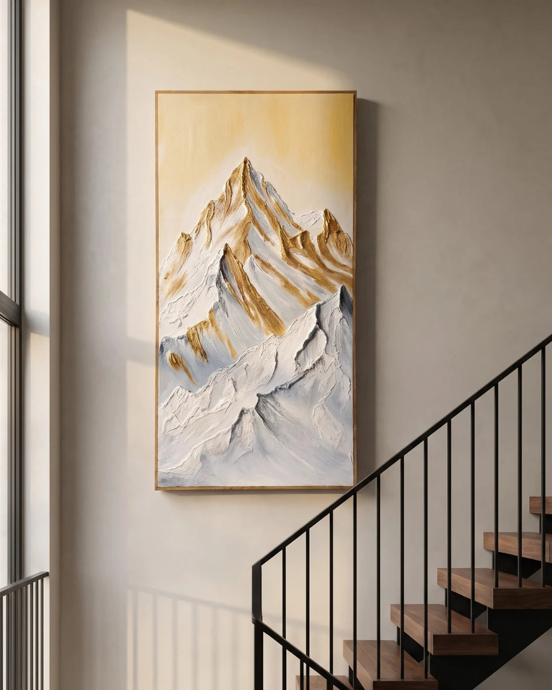 Summit Gold textured mountain painting hanging on a stairwell wall in a modern Indian home