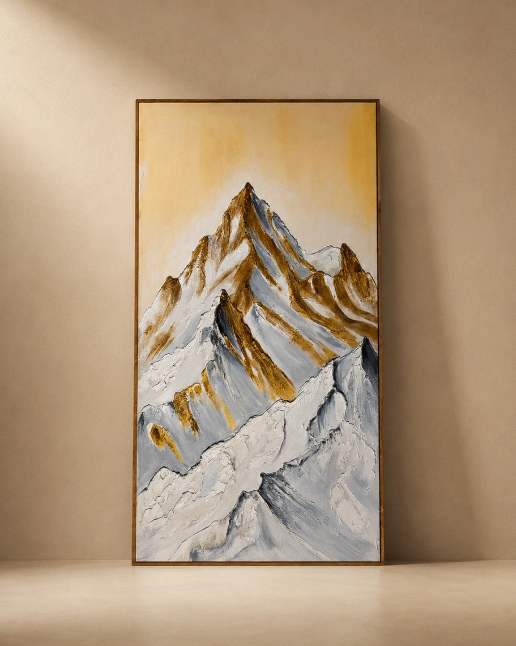 Gold and white textured mountain wall art with hand-applied metallic peaks on plain background, handmade canvas painting