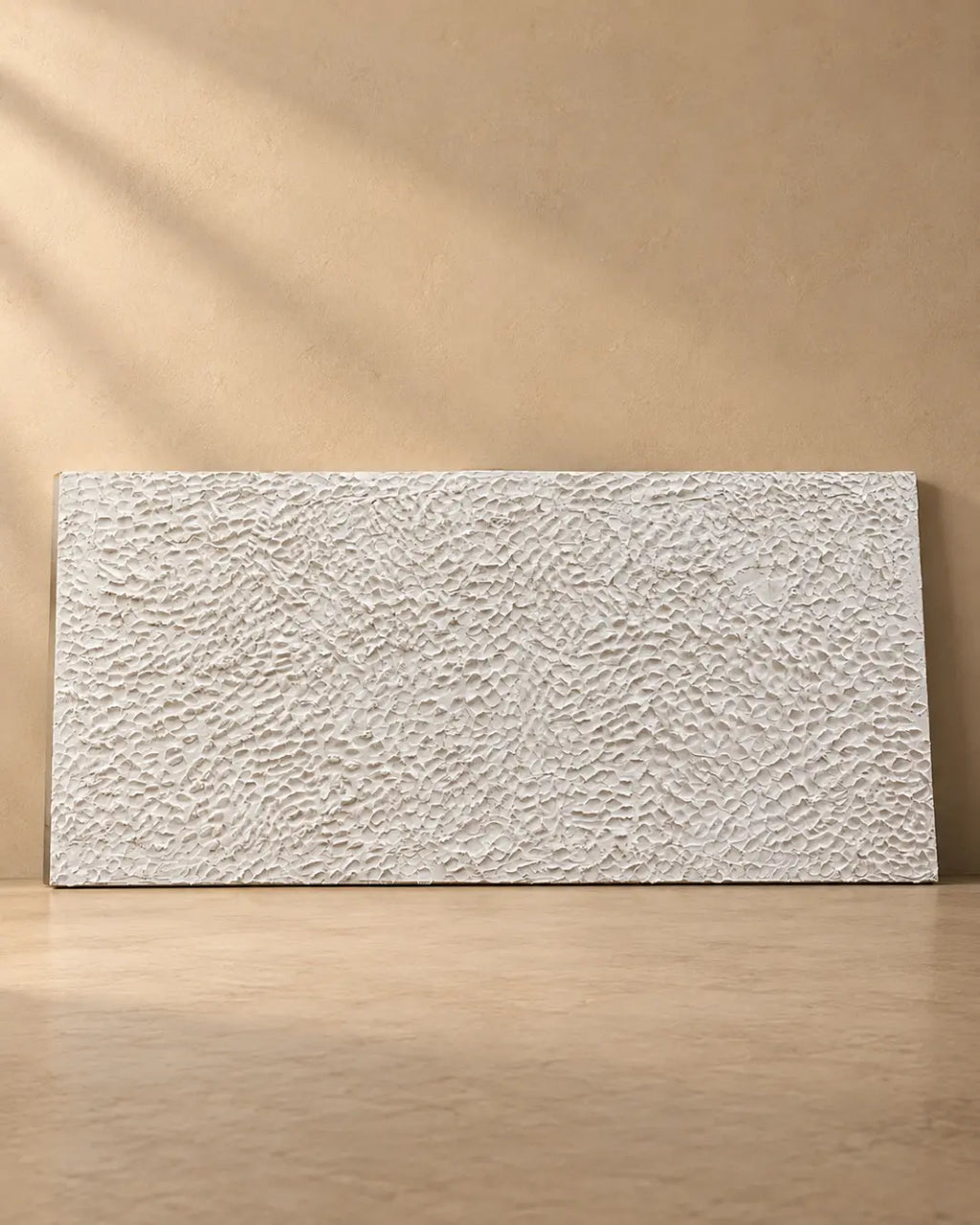 Ivory textured wall art with dense hand-carved crackled relief on plain background, handmade canvas painting