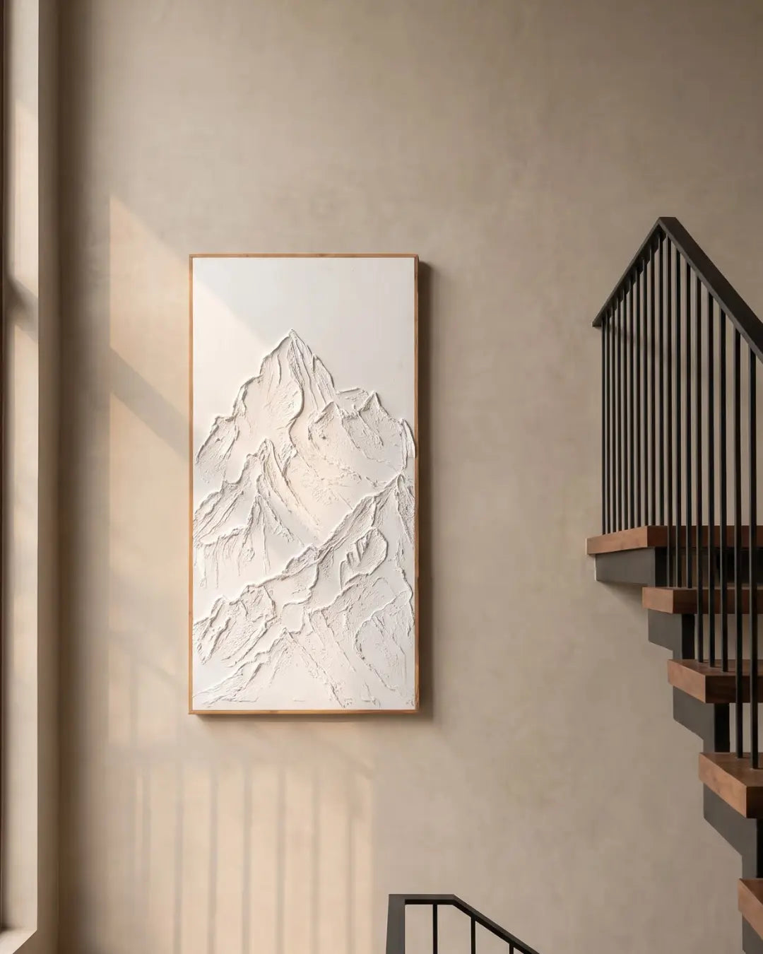 White Peak sculptural mountain painting hanging on a stairwell wall in a modern home